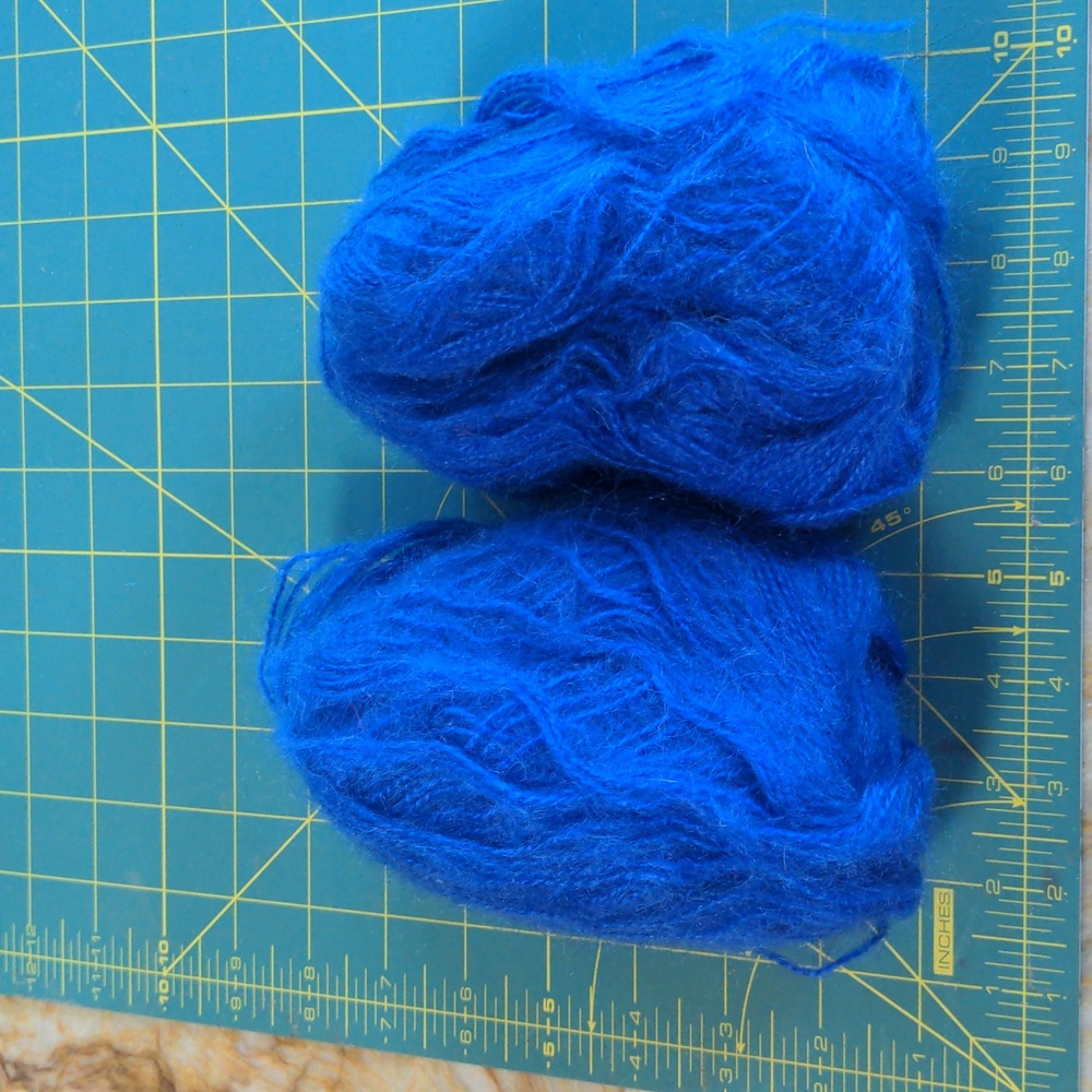 2 blue Skeins of yarn